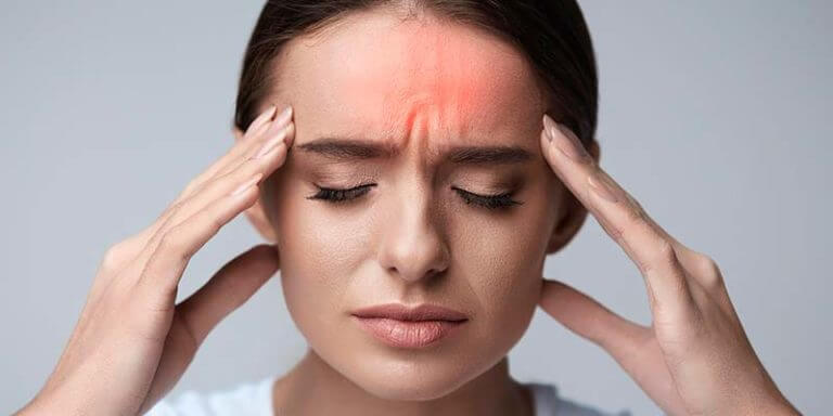 A girl experiencing headache