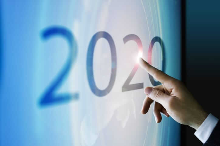 Businessman touching the screen about 2020